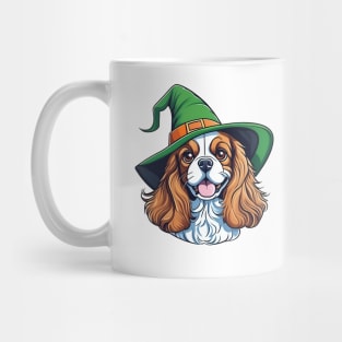 A brown and white dog wearing a green witches hat Mug